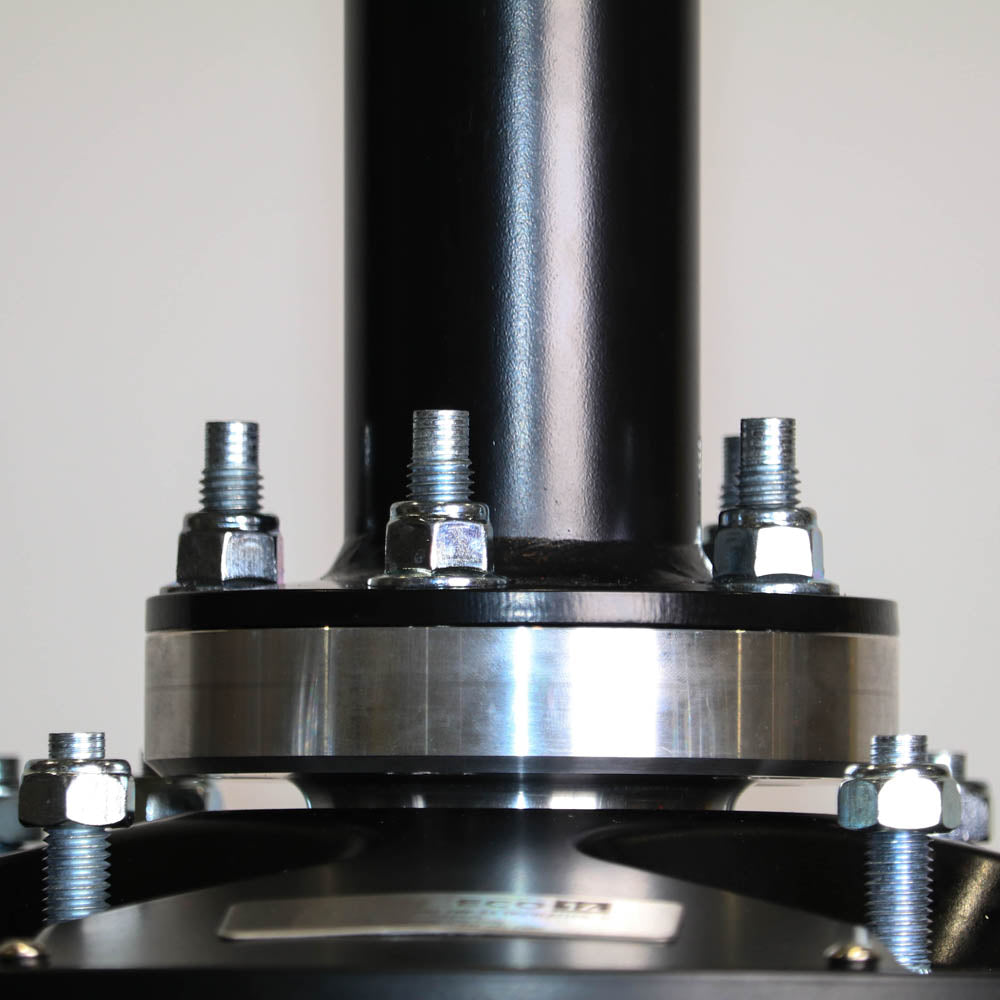 Close-up of an ECO Industrial ceiling fan adjustable downrod connection showing bolts, nuts, and mounting hardware.
